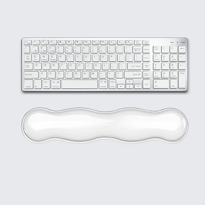 HandsCross transparent ergonomic keyboard wrist rest with contoured design for comfortable typing support