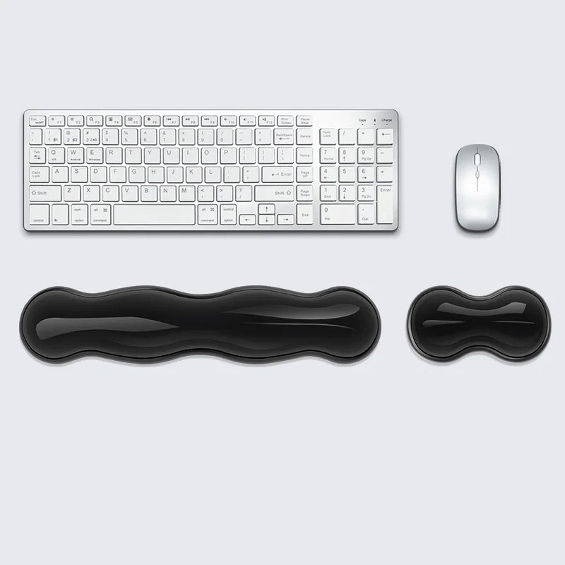 HandsCross ergonomic keyboard wrist rest in black with separate mouse wrist support shown with white keyboard and mouse